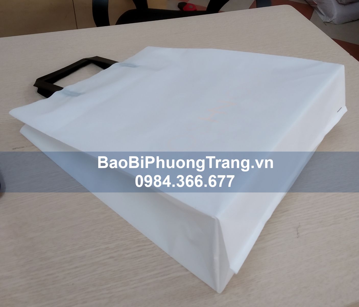 túi nilon xúp đáy gắn quai